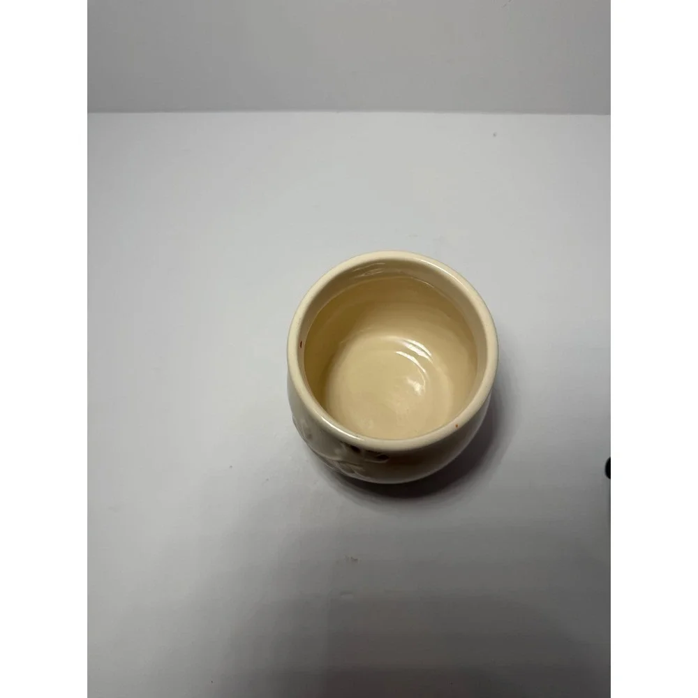 Cream Ceramic Jar with Embossed Floral Vine and Dark Brown Lid and Base